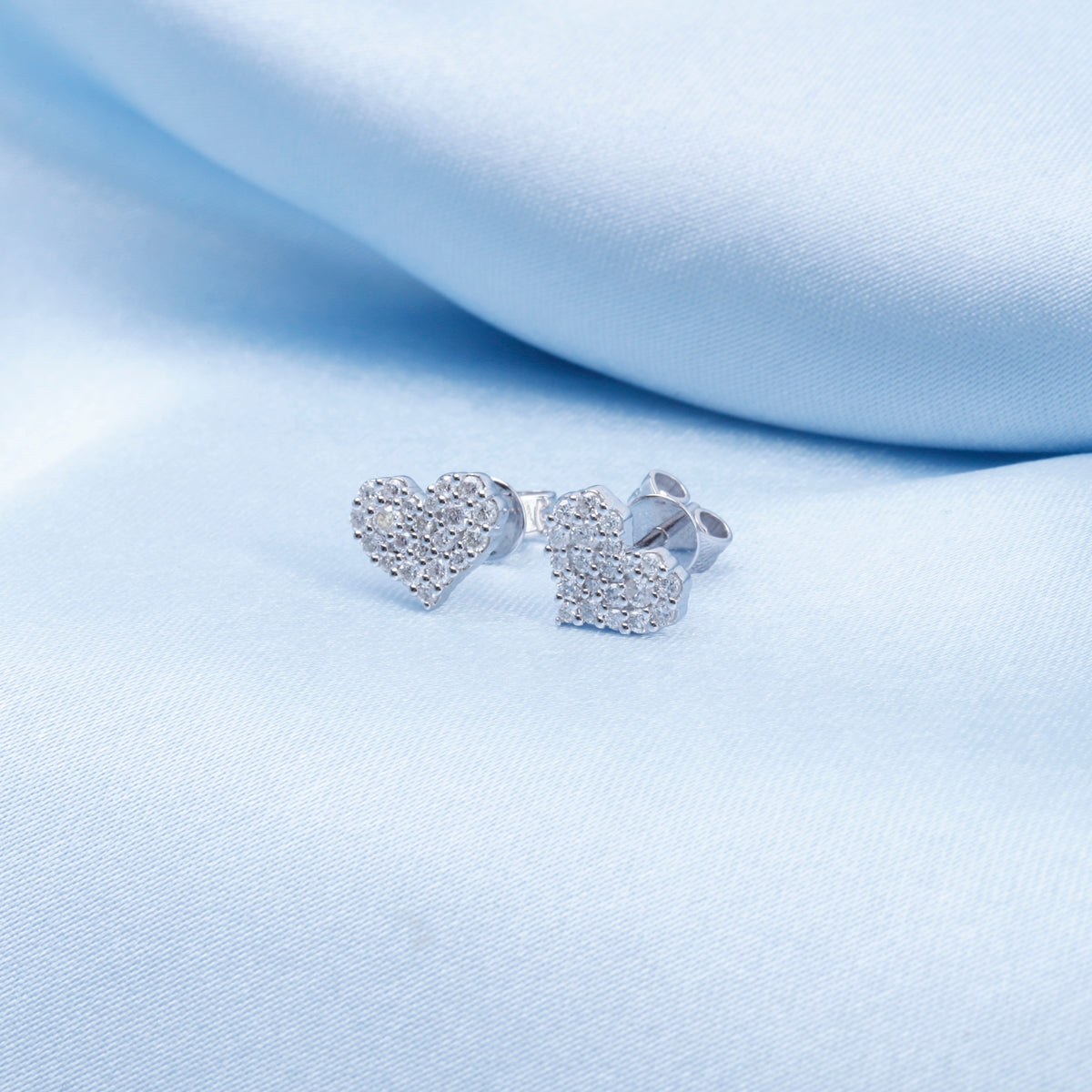 Cluster Heart Studs are bound to steal your heart. Cluster diamonds in a heart shape in 14k gold 