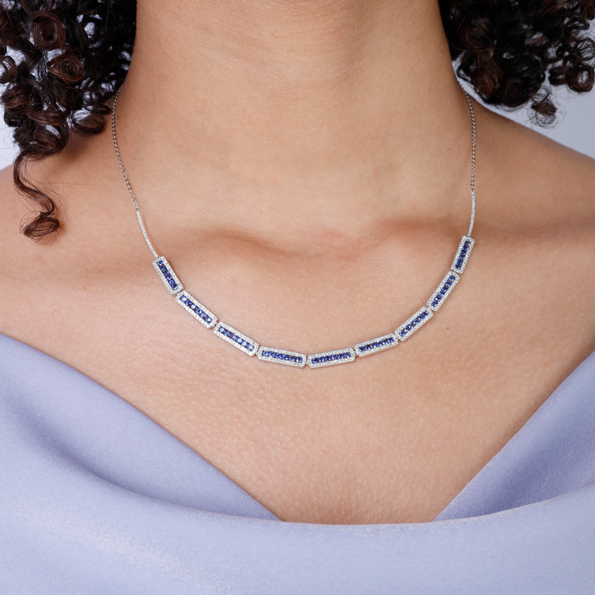 Delicate halo design and secure closure, with a variety of precious options. 