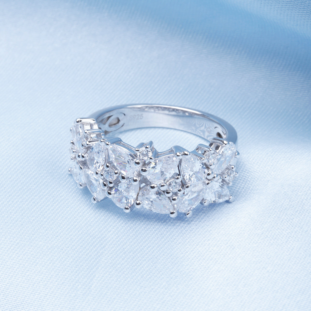 Make a statement with this Bold Cluster Ring. Crafted and encircled in shimmering diamond stones.