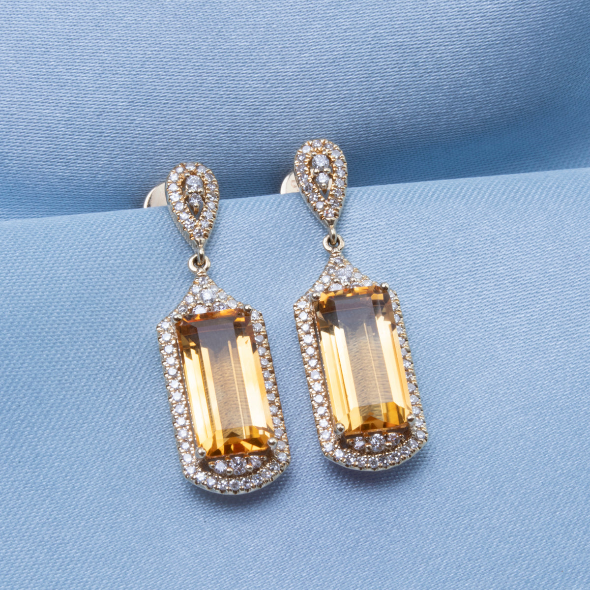 Elegant Art Deco Emerald Cut Earrings with stunning gemstone details. Variety of gemstone colors. 