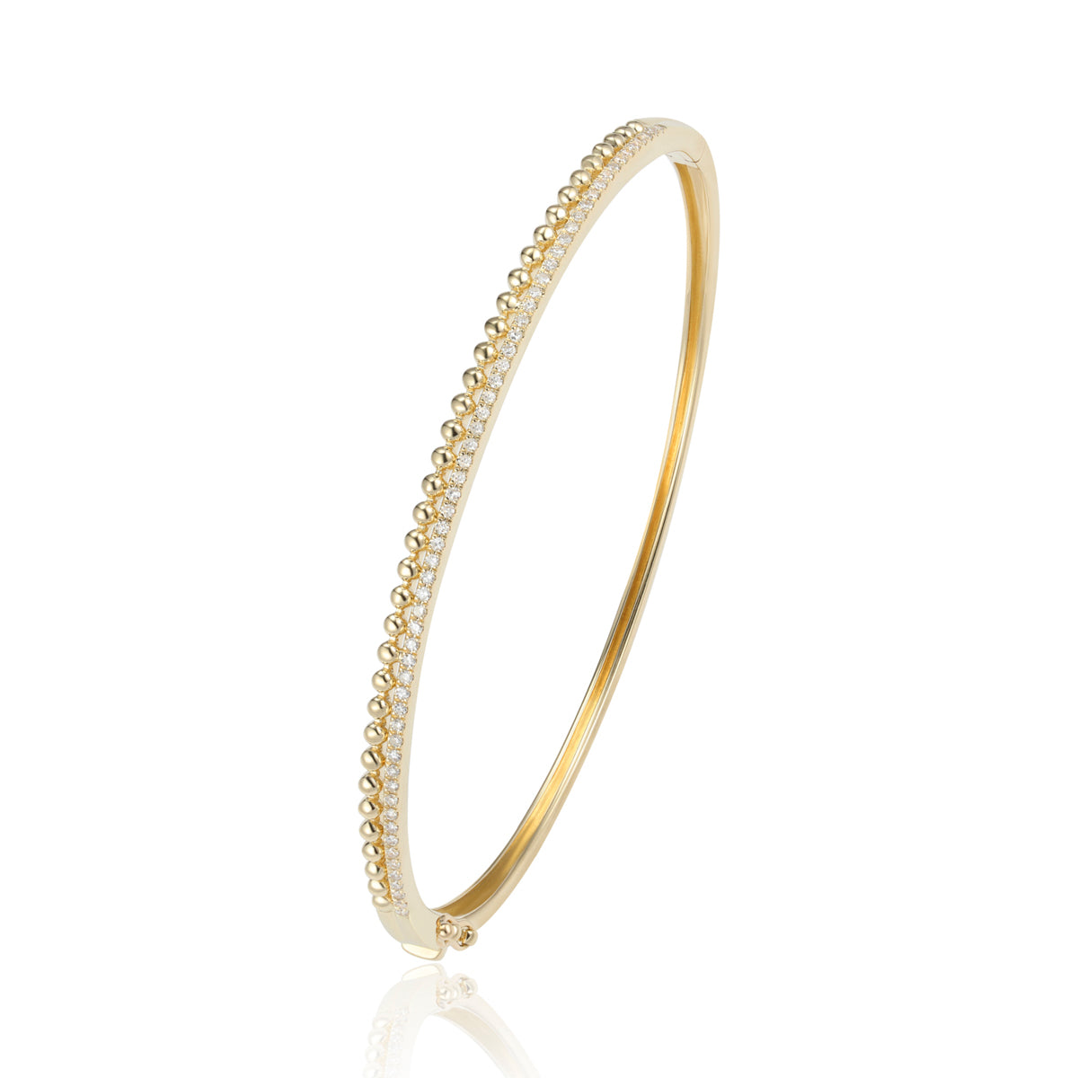 Beaded Gold Bangle features beaded accents that radiate classic charm. Add a touch of sophistication