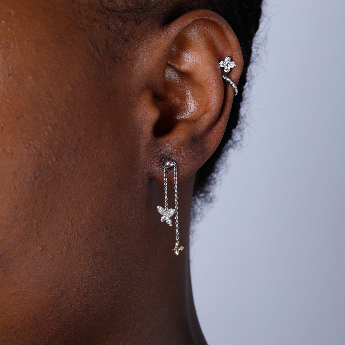 Butterfly Chain Earrings with delicate chains and butterflies, creating a sense of wonder and beauty