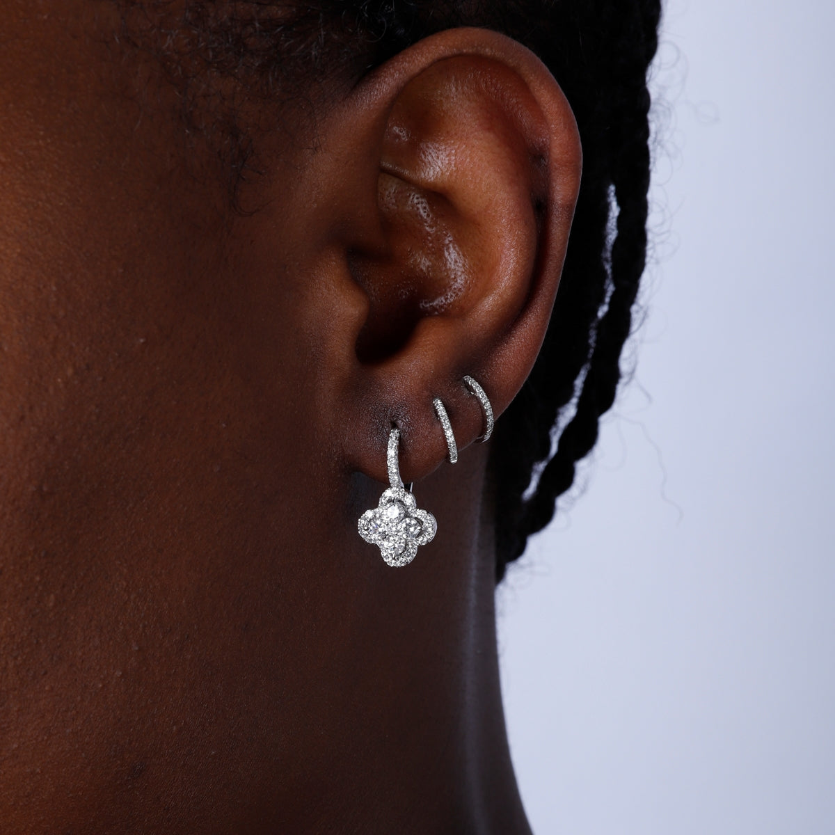 Handcrafted earrings with diamonds in a stunning cluster design. 