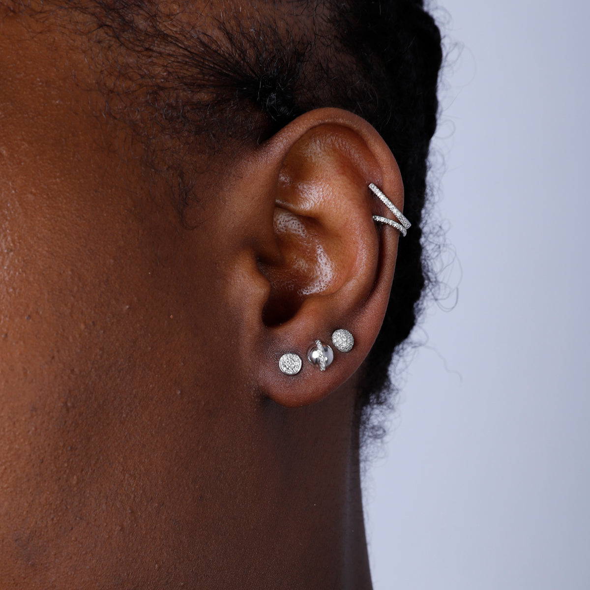 Simple & classic circle stud that exude elegance. Encrusted with pave diamonds, perfect for everyday